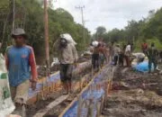 Gotong Royong Satgas TMMD dan Warga Percepat Pembangunan Jalan di Jalur Sulit Pedesaan